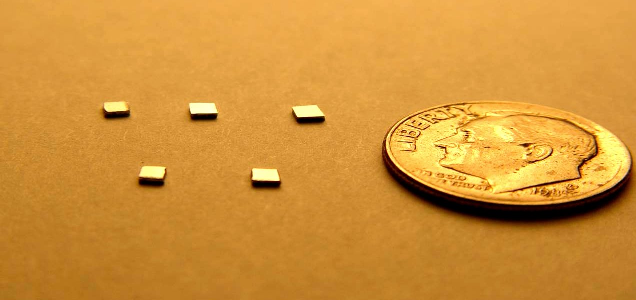 TEG chips beside a US dime for scale
